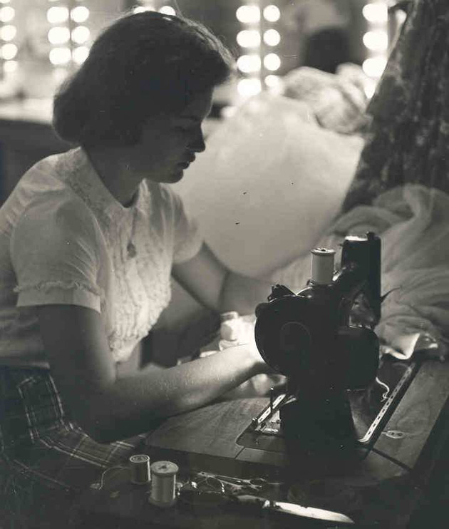 Student Betty Napierski using a sewing machine